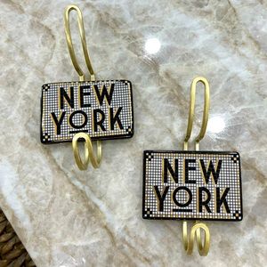 “New York, New York” Anthropologie hooks.